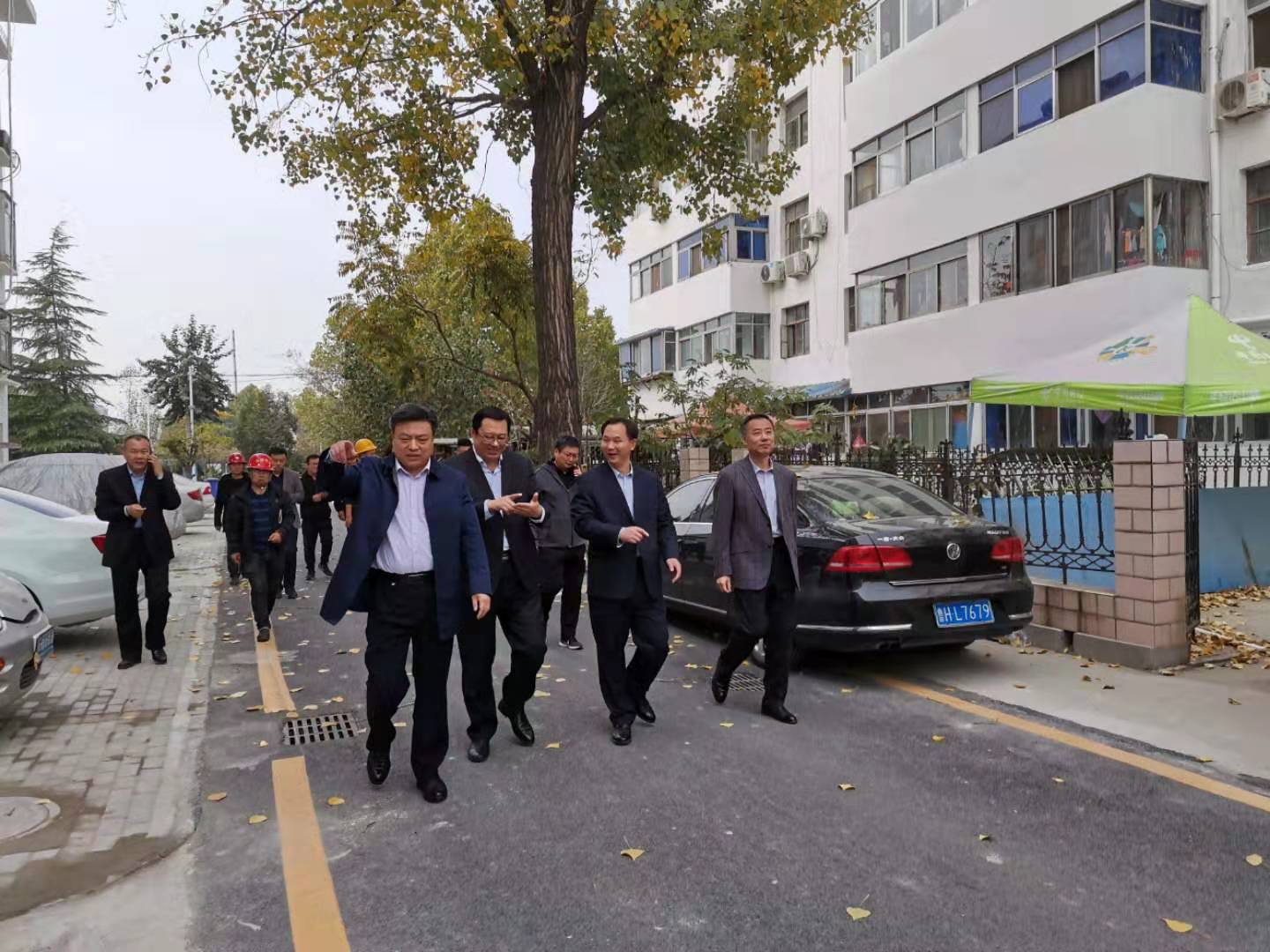 曲阜市住建局局长朱兴武一行检查我校节能改造工程